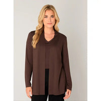 A woman modeling a long-sleeve brown open-front cardigan or tunic with a draped neckline over a matching brown top and black pants, photographed against a plain light gray studio background.