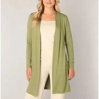 Front of a open cardigan in pale green. Long sleeves and falls to mid thigh. 
