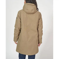 Person wearing a beige parka coat on a white background