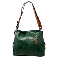 Dark green bag with a horizontal zip down the front with a tan zip tab. Tan coloured handle. 