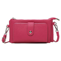 A bright pink pebbled faux-leather crossbody wallet with a front pocket, silver-tone snap button, and matching pink strap with silver hardware, shown on a plain white background.