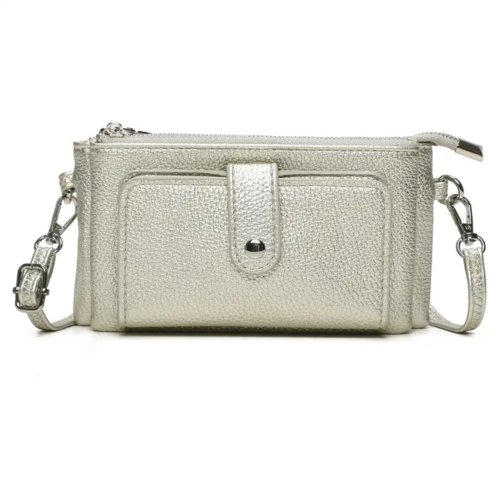 A silver pebbled leather crossbody wallet with a front pocket, top zipper, and silver hardware, shown on a plain white background.