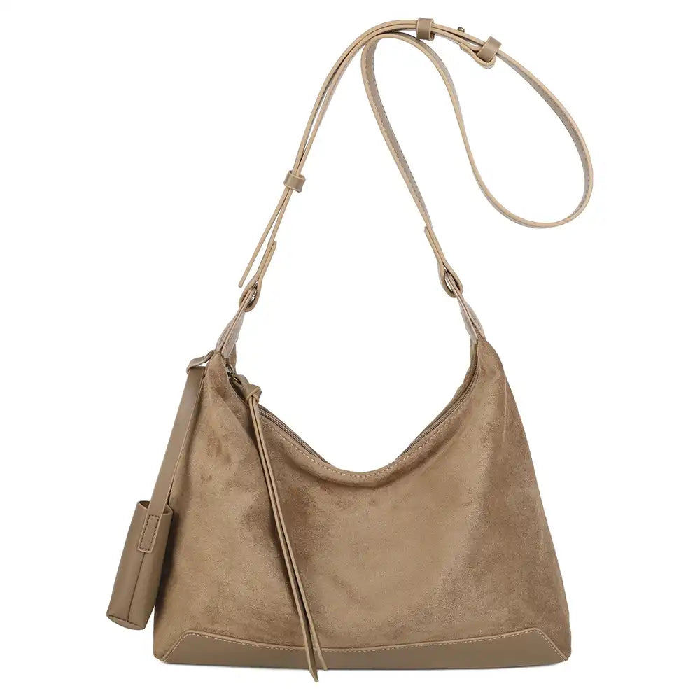 A taupe suede hobo shoulder bag with a matching adjustable shoulder strap and a small side pouch, shown against a plain white background.