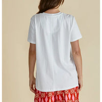 White tee with short sleeves. 