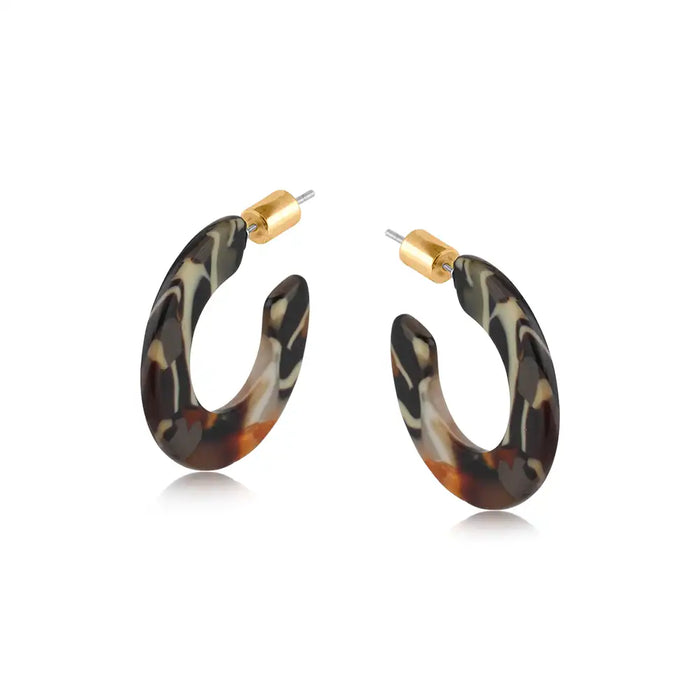 Flat oval hoop earrings in mottled brown and black with gold coloured stoppers