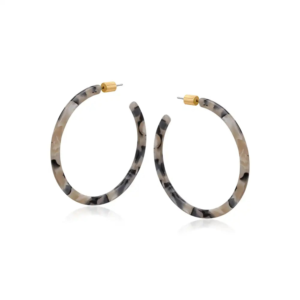 Large skinny resin hoops in grey mottles.