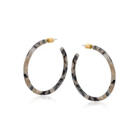 Large skinny resin hoops in grey mottles.