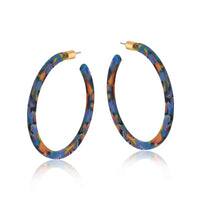 Big Metal London hoop earrings for pierced ears. Resin includes blues, orange and black.