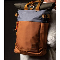 Billy Belts orange and grey roll top back pack. 