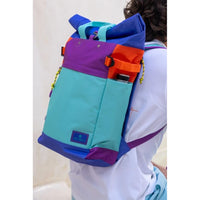 Billy Belts bright multi coloured roll top back pack. 