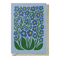 Greeting card with blue floral design on a light blue background