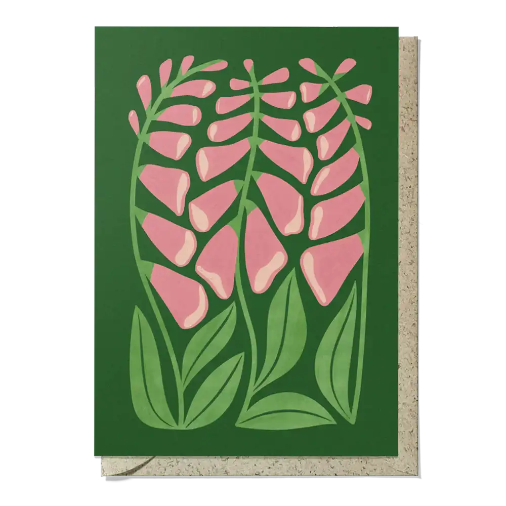 Greeting card with pink floral design on a green background