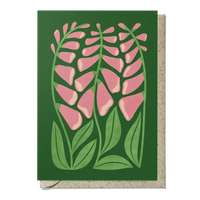 Greeting card with pink floral design on a green background