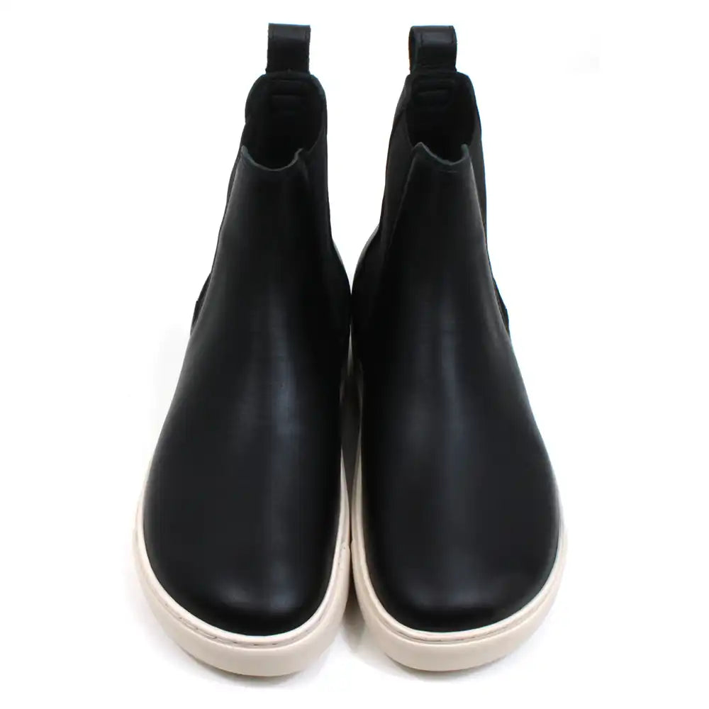 Birkenstock Bend Chelsea boots in black with cream coloured soles. Elasticated ankle side panels. Pull tabs at the back. Front view.