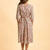 Floral dress on a beige background