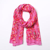 Butterfly Fashions fuchsia patterned scarf.