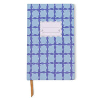 Notebook with blue geometric pattern on a white background
