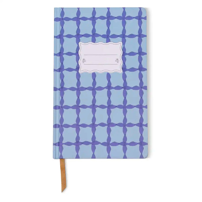 Notebook with blue geometric pattern on a white background