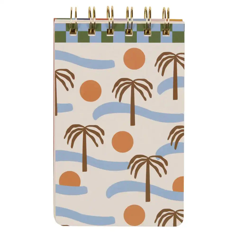 Notebook with palm tree and wave pattern on a white background