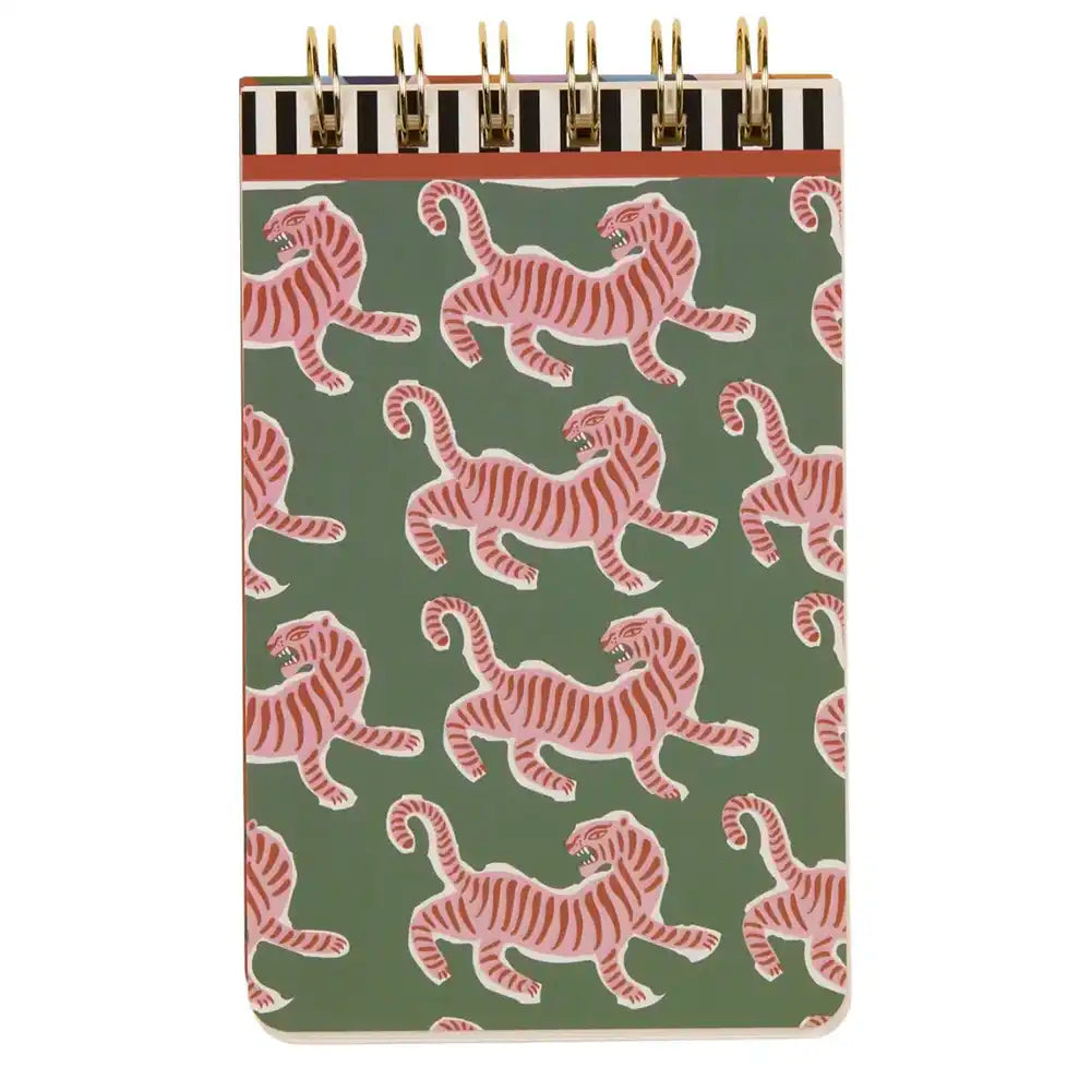 Notebook with pink tiger pattern on a green background