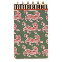 Notebook with pink tiger pattern on a green background