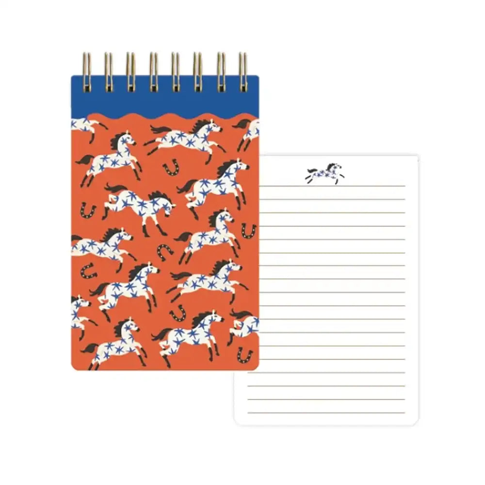 Notebook with horse pattern on orange cover and lined pages