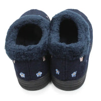 A pair of navy blue slip-on slippers with plush faux-fur trim and embroidered blue and white flowers, shown from a top-down view on a white background.