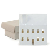 White plastic grid with cardboard roll on a white background