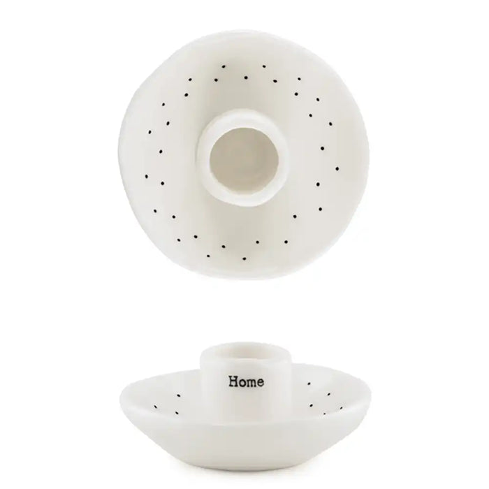 White ceramic holder with small bowl on a white background