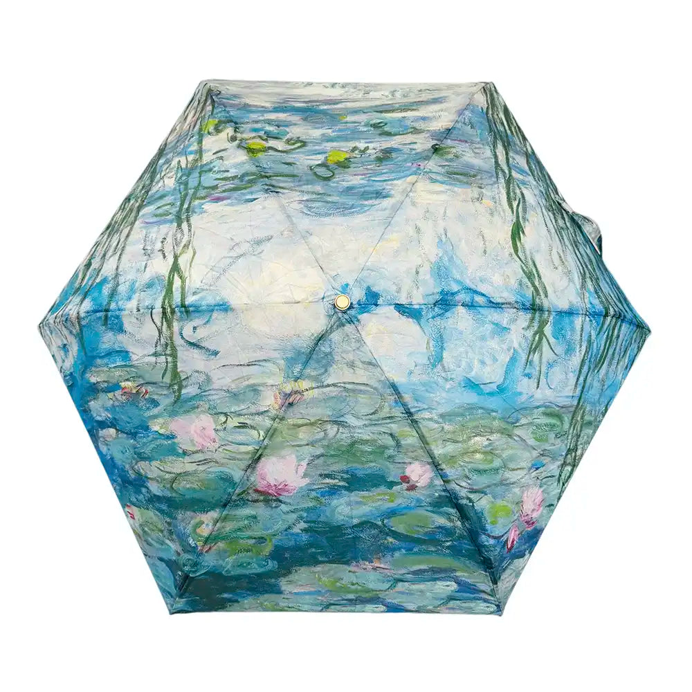 Umbrella with a design inspired by Monet's 'Water Lilies' painting on a white background
