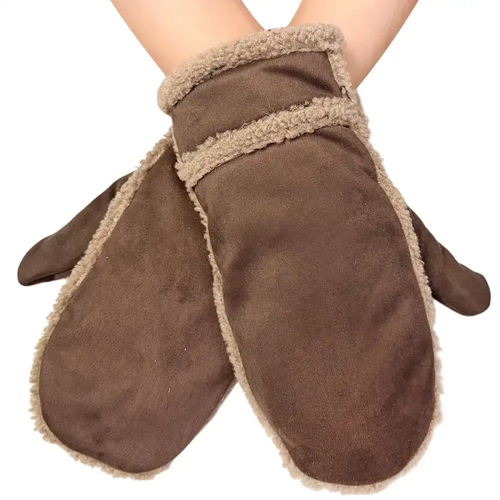 A pair of brown suede-like mittens with beige sherpa lining, shown on a person's hands against a plain white background.