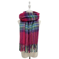 Multicolored plaid scarf on a mannequin with a white background
