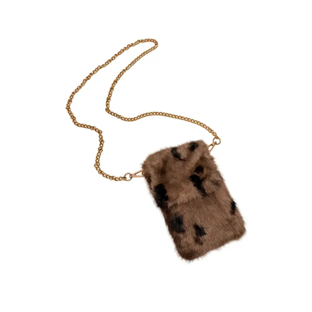 A rectangular faux fur crossbody phone bag in brown with black spots, attached to a gold chain strap, shown on a plain white background.