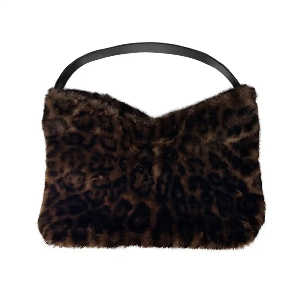 A leopard-print faux fur shoulder bag with a black leather handle, shown against a plain white background.