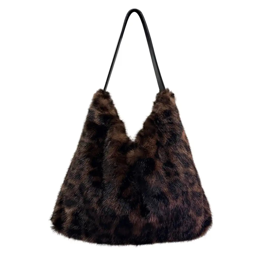 A dark brown and black faux fur hobo shoulder bag with a single black strap, shown against a plain white background.