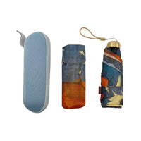 A compact umbrella set shown in three views on a plain white background: an open light blue case on the left, the umbrella partially folded in the center, and the umbrella fully folded with a wrist strap and gold-toned cap on the right. The umbrella fabric has an abstract blue, orange, and cream pattern.
