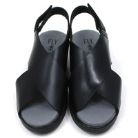 Fly London Bridle sandals in black. Cross over design over foot. Velcro fastening around the heel. Front view