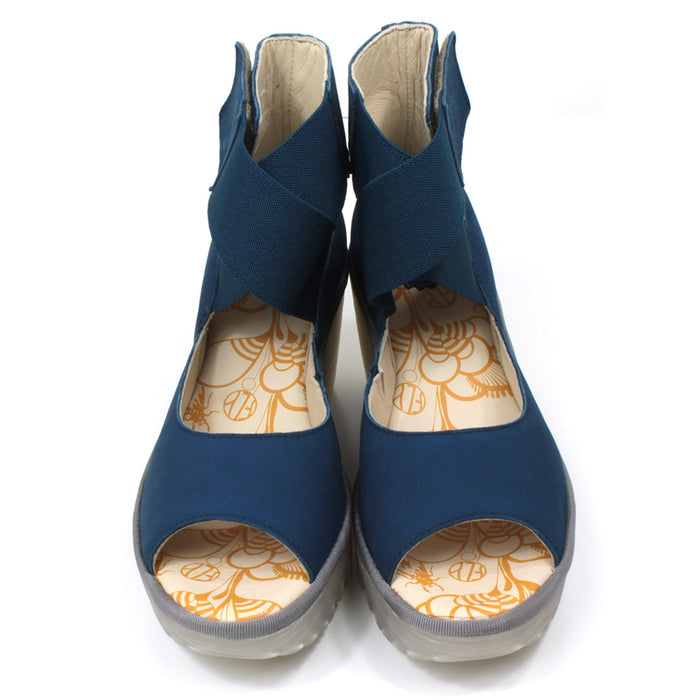 Fly London blue Cupido sandals with high ankle straps. Semi translucent platforms and  raised heels. Front view