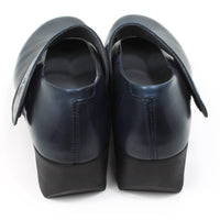 Fly London navy blue chunky wedge soled Mary Jane shoes with wrap over straps. Back view.