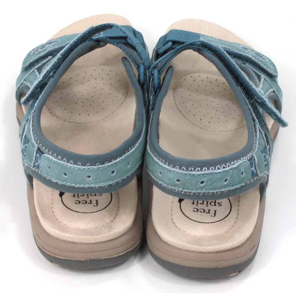 Moroccan blue walking sandals with pale beige padded insoles. Velcro adjustable straps. Back view.