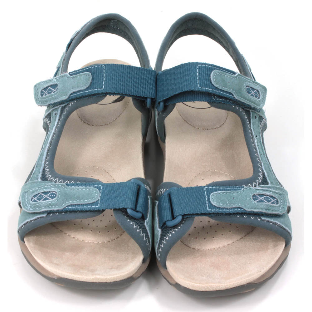Moroccan blue walking sandals with pale beige padded insoles. Velcro adjustable straps. Front view.