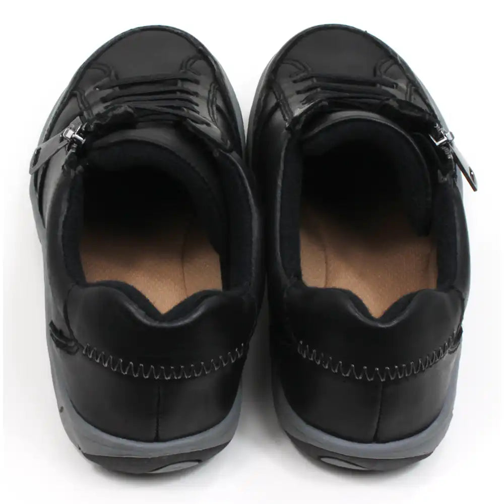 Free Spirit Hadlee black trainer style shoes. Black laces and a black zip for fitting and adjustment. Padded ankle cuffs. Back view.