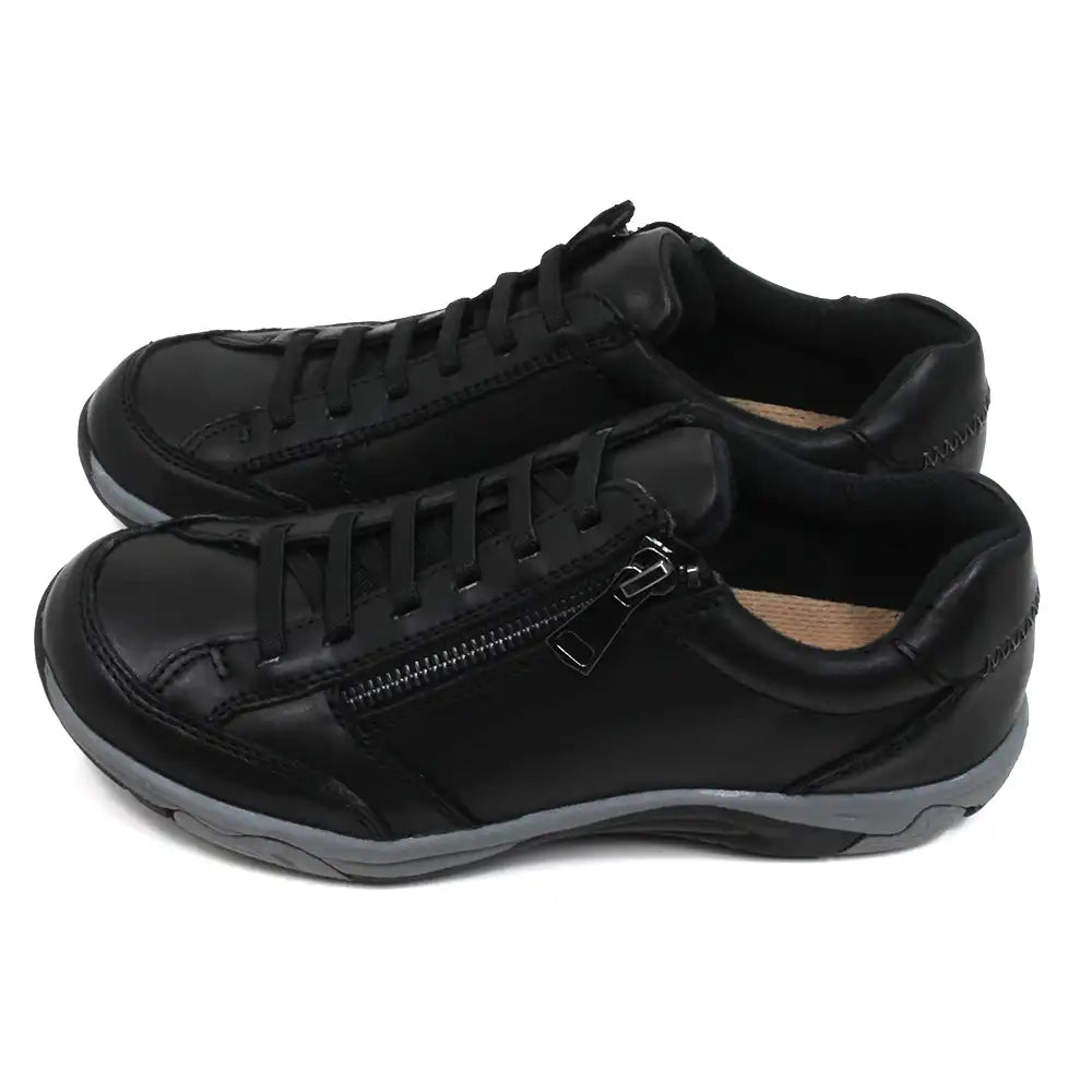 Free Spirit Hadlee black trainer style shoes. Black laces and a black zip for fitting and adjustment. Padded ankle cuffs. Side view.