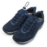 Free Spirit Jada Moonlit Ocean blue trainers with elasticated fitting and adjustment of the foot. Grey edging around black soles. Angled view.