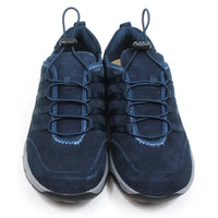 Free Spirit Jada Moonlit Ocean blue trainers with elasticated fitting and adjustment of the foot. Grey edging around black soles. Front view.