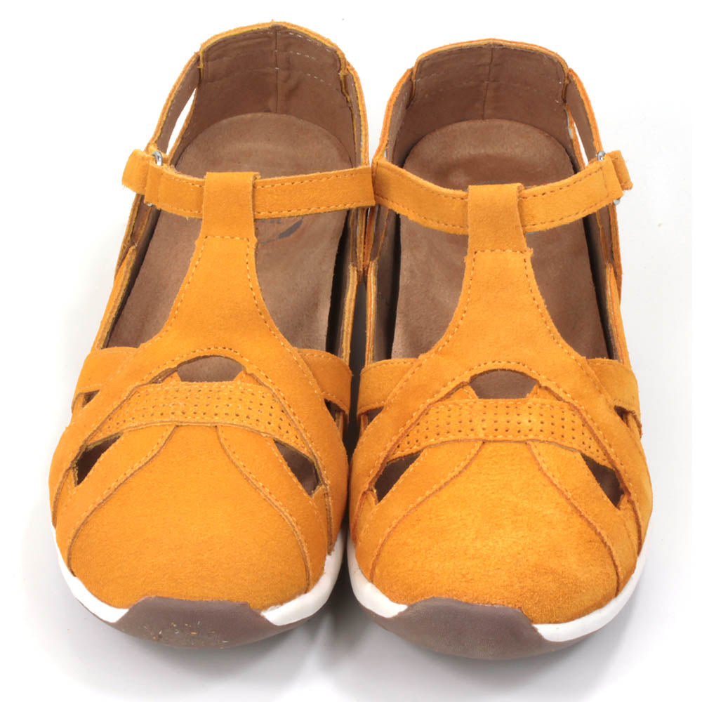 Leather sandals which enclose feet and heels. Bright mustard colour. Front view.