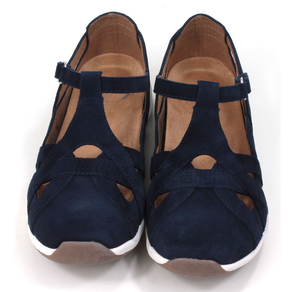 Full foot and heel covering sandals in navy blue suede leather. White soles. Adjustable velcro straps. Front view.