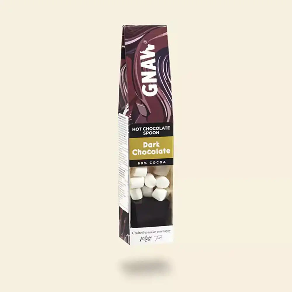 Box of GNAW Dark Chocolate Hot Chocolate Spoon on a beige background