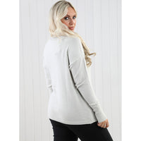 Goose Island long sleeved, polo necked oatmeal top. Back view.