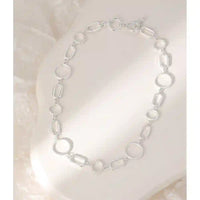 Mixed shape silver necklace with T bar fastener